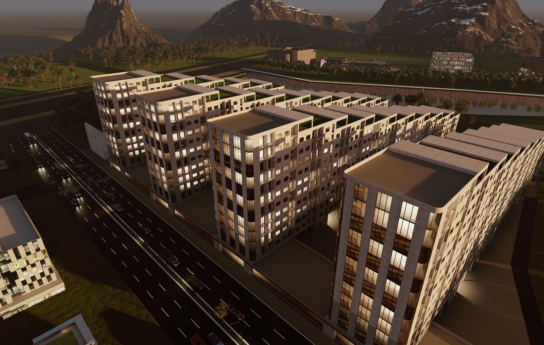 Night aerial of the full Al Qanat masterplan with mountains rising behind the quarter.