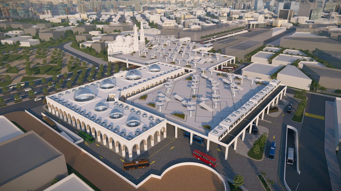 Aerial render of the precinct's shaded courts and repeated arches, the historic mosque at its centre.
