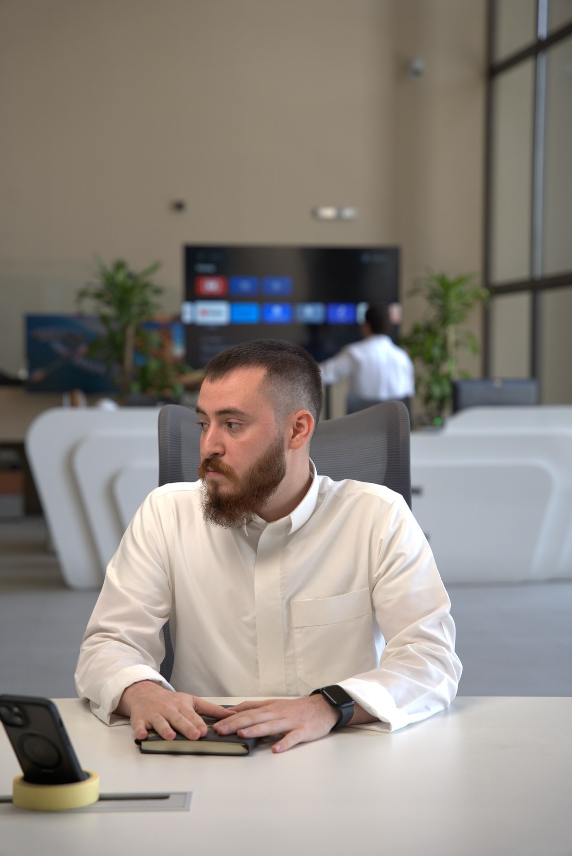 An architect at work in the Madinah studio